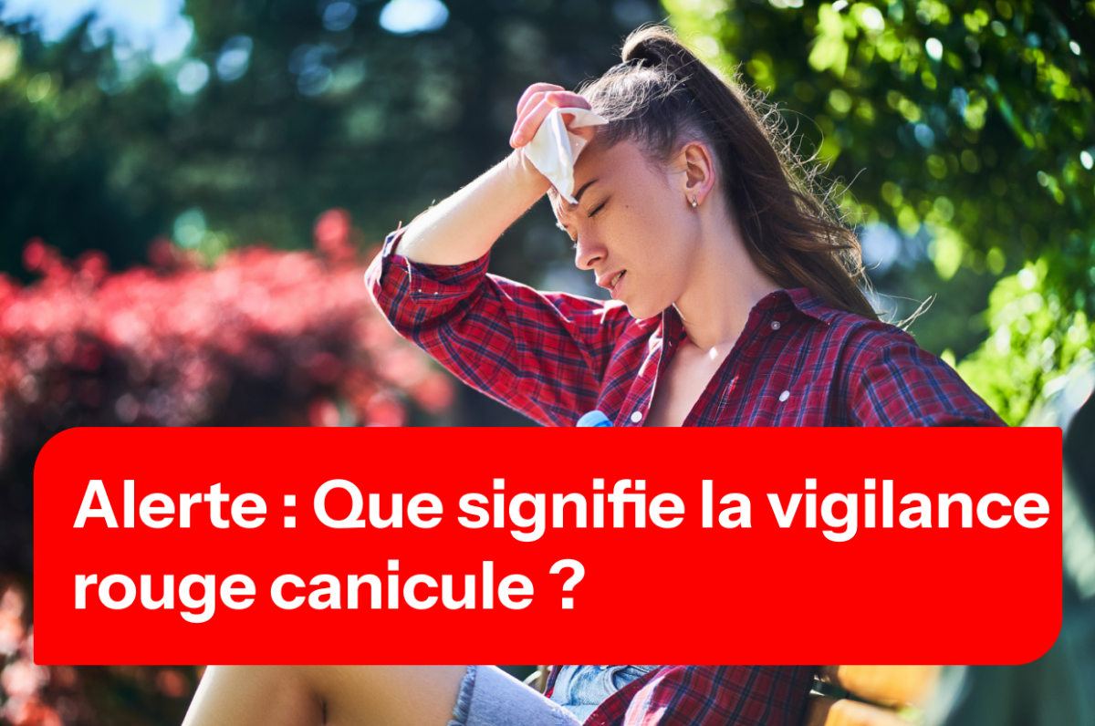 Jeune femme assise qui s'éponge le front