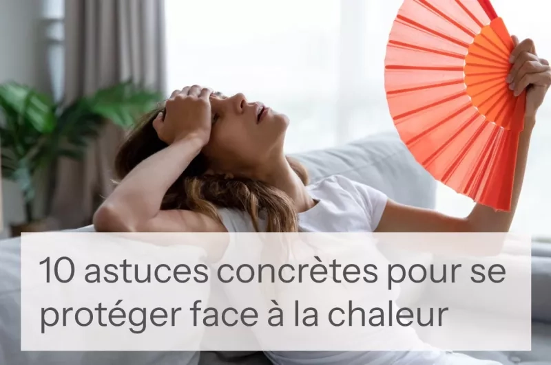Une femme s'évente et semble avoir très chaud