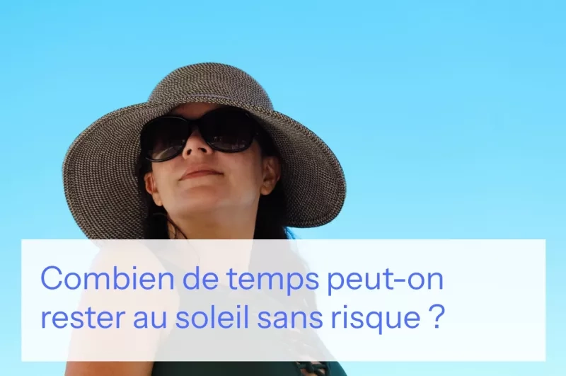Femme avec chapeau et lunettes de soleil