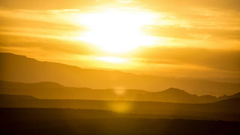 silhouette of mountains during golden hour