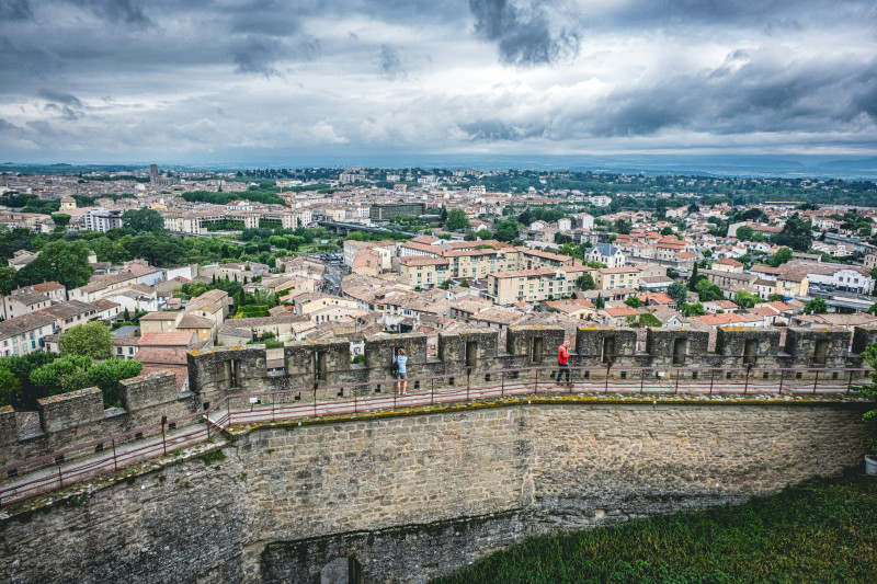 A view showing the inner ramparts of the Cité de Carcassonne with the Basse and Bastide areas of the town in the distance