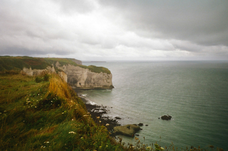 a view of the ocean from a cliff