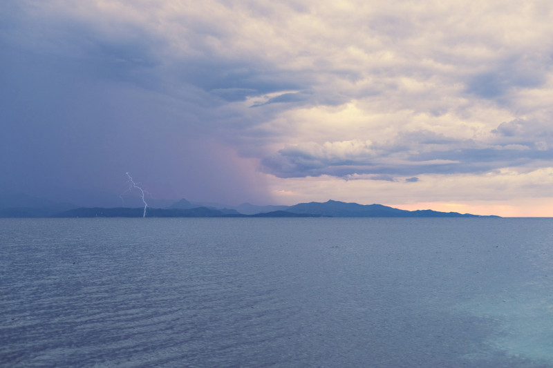 a body of water with a land in the distance