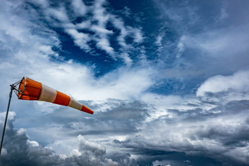 a wind sock with wild skies